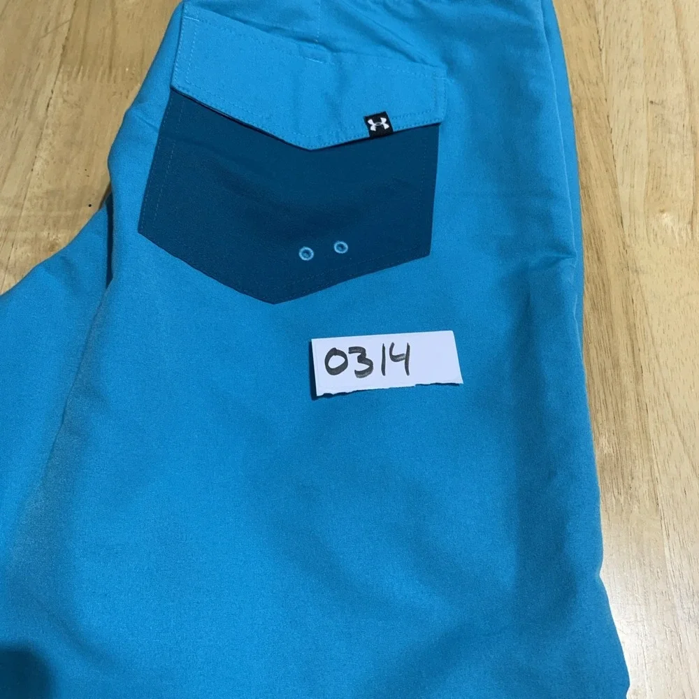 Under Armour Swim Trunks Men s 32 Teal Loose Heatgear Flap Pocket Beach Swimming